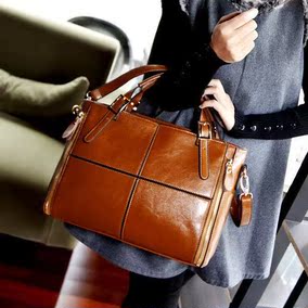 正品[真皮 特价女包]品牌特价真皮女包评测 图片