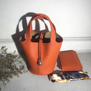 荔枝纹手提水桶包