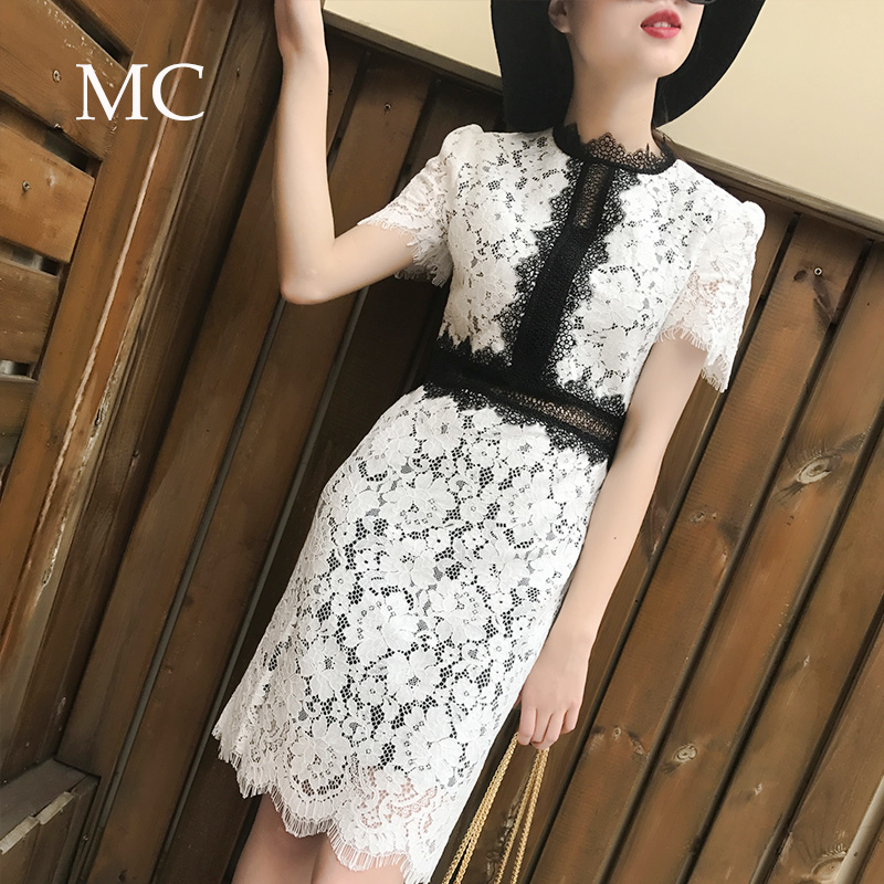 mc欧美女装2018春装新款明星同款镂空显瘦拼接短袖气质蕾丝连衣裙
