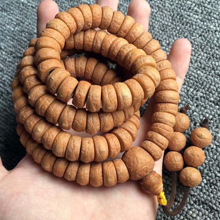 尼泊尔龙眼凤眼颗颗留眼精工打磨扇形藏式切片正眼菩提子手串佛珠