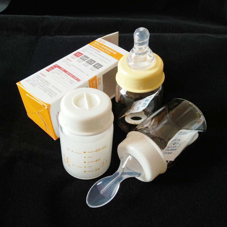 查看淘宝爱得利新生儿耐高温晶钻玻璃奶瓶60ml迷你喂水全硅胶软头勺子